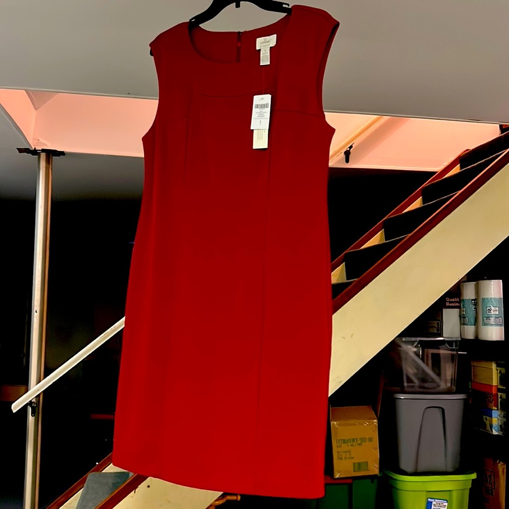 So slimming Red Dress by Chicos. Brand new with tags.